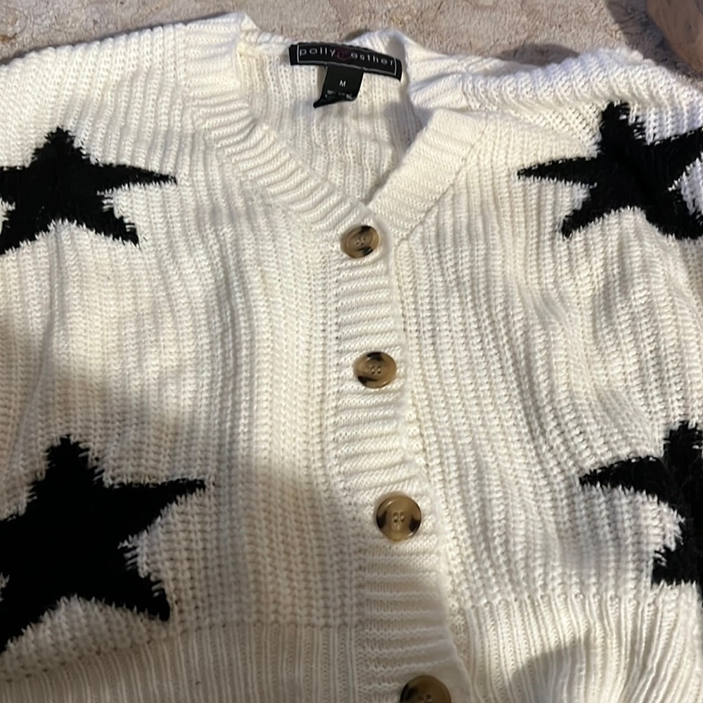 Polly Esther button up sweater. New. Size Medium